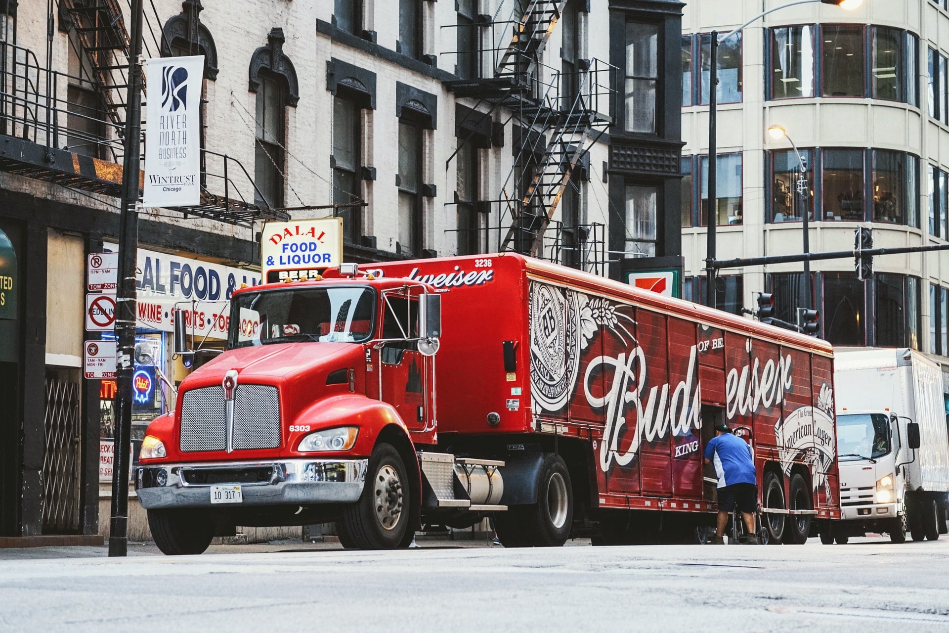 Budweiser making a delivery in a city where healthy restaurant vendor management is a priority. 