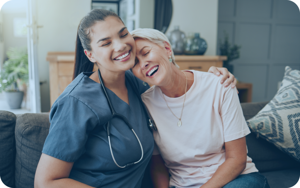 Healthcare worker embracing patient