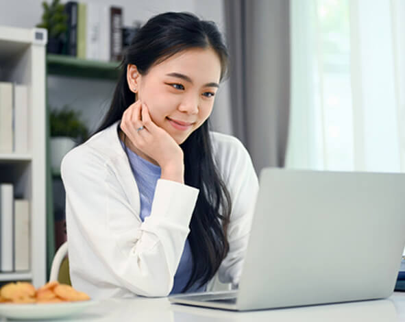 doctor using laptop at work