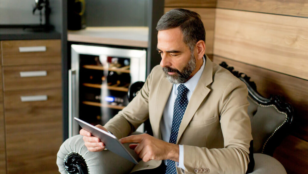 senior businessman-with digital tablet