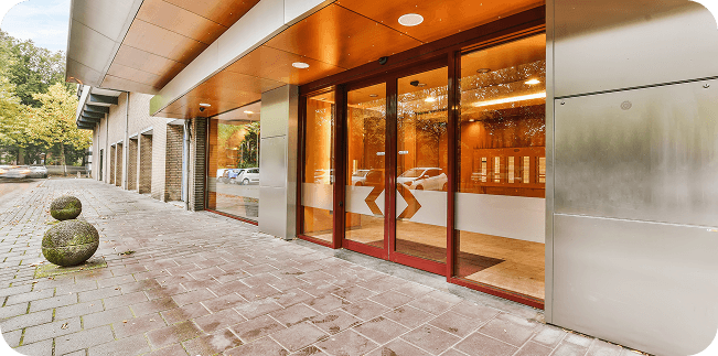 Modern building entrance with glass sliding doors